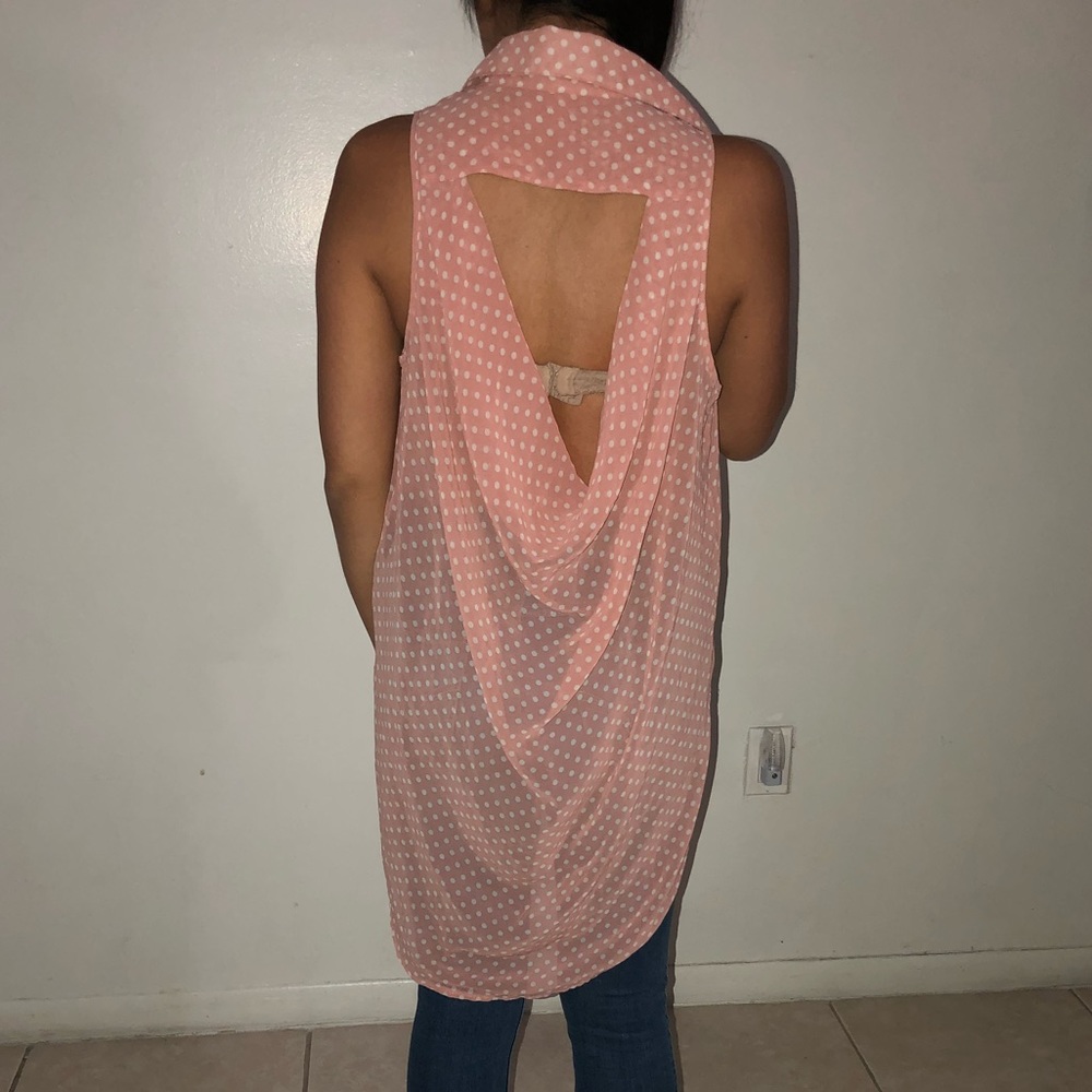 High low pink and white polka dot shirt